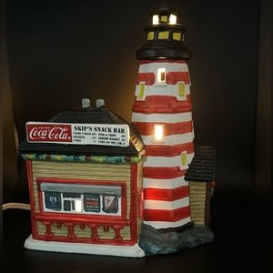 Coca-Cola Town Square Christmas Village - Skip’s Snack Bar & Lighthouse